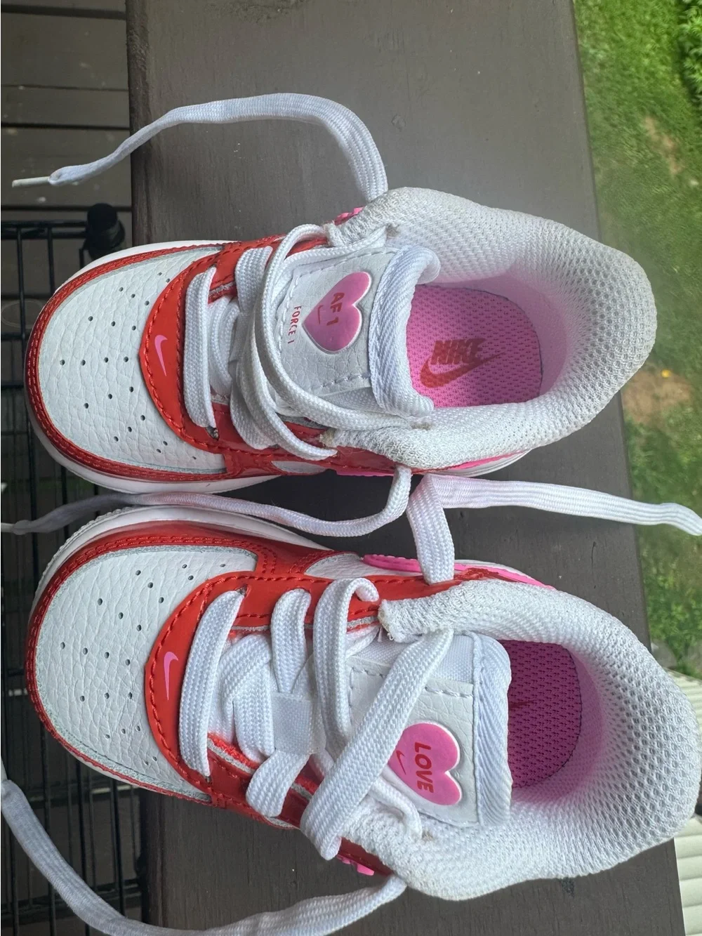 Nike Kids White Sneakers with Pink Swoosh and Orange Panels